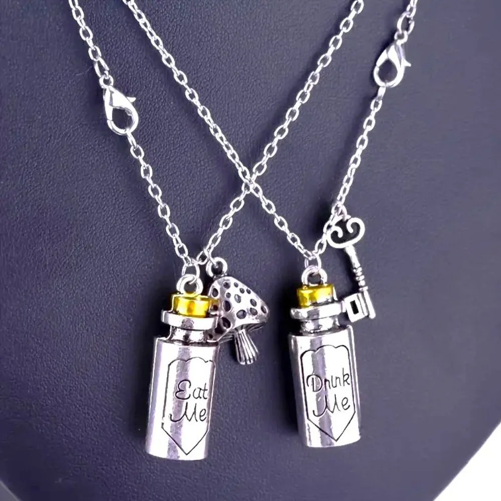 Alice in Wonderland 2pc Necklaces Eat Drink Me Bottle Dream Fantasy Trip Disney